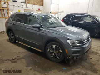 2018 Volkswagen Tiguan SEL with VIN 3VV2B7AX5JM102255, listed as a Copart auction lot 51699695 with 103,478 mi miles and Salvage Title. Bid and sale history available at carsss.com. Image 4.