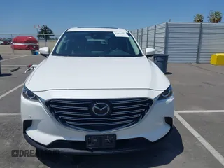 2019 Mazda CX-9 Touring with VIN JM3TCACY8K0300956, listed as a IAAI auction lot 42493003 with 123,709 mi miles and . Bid and sale history available at DreamBid. Image 13.