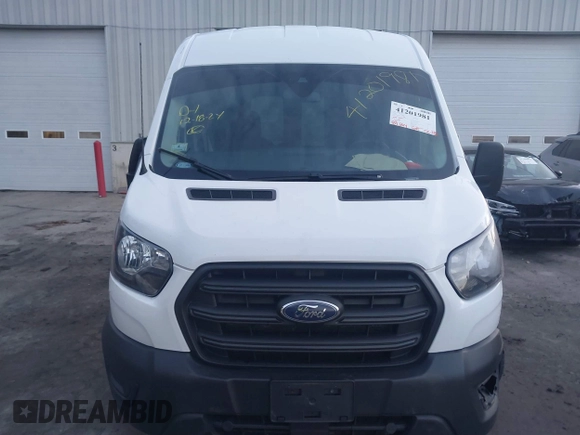 2020 Ford Transit Cargo z VIN 1FTBR2C87LKA34635, wystawiony jako IAAI lot #41201981 z przebiegiem 89 814 mil mil oraz . Historia ofert i sprzedaży dostępna na DreamBid. Obrazek 12.