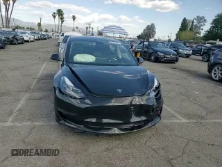 2023 Tesla Model 3 z VIN 5YJ3E1EA3PF713735, wystawiony jako Copart lot #51821995 z przebiegiem Nie podano mil oraz Szkoda całkowita • Salvage title. Historia ofert i sprzedaży dostępna na DreamBid. Obrazek 11.