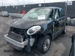 2014 FIAT 500L Easy with VIN ZFBCFABH1EZ001328, listed as a IAAI auction lot 38865855 with Not Provided miles and . Bid and sale history available at DreamBid. Image 2.