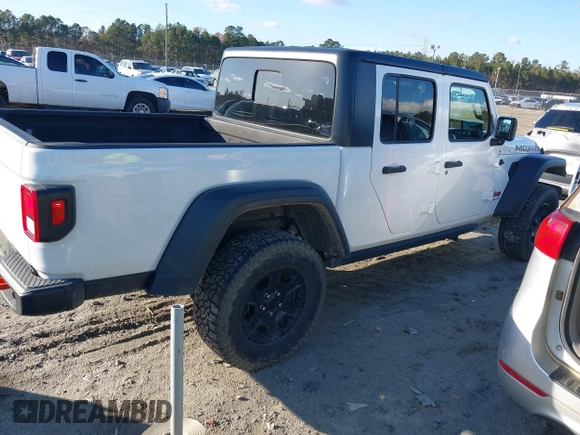 2022 Jeep Gladiator Mojave with VIN 1C6JJTEG4NL172098, listed as a IAAI auction lot 41141975 with 44,824 mi miles and . Bid and sale history available at DreamBid. Image 4.