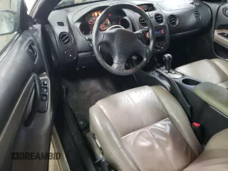 2003 Mitsubishi Eclipse GTS with VIN 4A3AE75H93E017736, listed as a Copart auction lot 86005414 with 128,934 mi miles and Salvage Title. Bid and sale history available at carsss.com. Image 8.