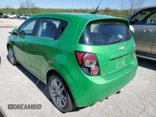 2014 Chevrolet Sonic LT with VIN 1G1JC6SB7E4233377, listed as a Copart auction lot 48409594 with 96,927 mi miles and Salvage Title. Bid and sale history available at carsss.com. Image 2.