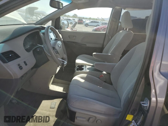 2012 Toyota Sienna LE AAS with VIN 5TDKK3DC6CS267895, listed as a Copart auction lot 53449855 with 114,699 mi miles and Salvage Title. Bid and sale history available at DreamBid. Image 7.