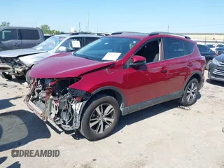 2018 Toyota RAV4 XLE with VIN 2T3WFREV8JW425464, listed as a IAAI auction lot 41977877 with 142,265 mi miles and . Bid and sale history available at carsss.com. Image 17.