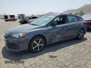 2021 Subaru Impreza Premium with VIN 4S3GTAD62M3712511, listed as a Copart auction lot 55652845 with 69,643 mi miles and Salvage title. Bid and sale history available at DreamBid. Image 1.