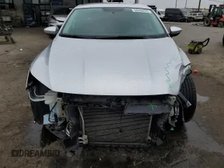 2017 Volkswagen Passat S with VIN 1VWAT7A32HC059233, listed as a Copart auction lot 58448495 with 65,534 mi miles and Salvage title. Bid and sale history available at DreamBid. Image 5.