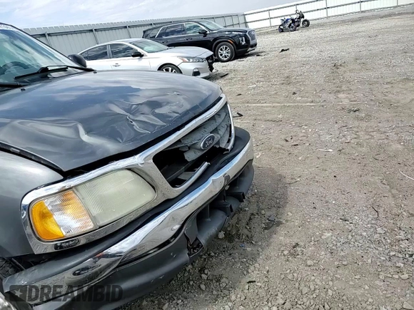 2003 Ford F-150 XL with VIN 1FTRX17L43NA66874, listed as a Copart auction lot 50741395 with 196,161 mi miles and Salvage title. Bid and sale history available at DreamBid. Image 11.