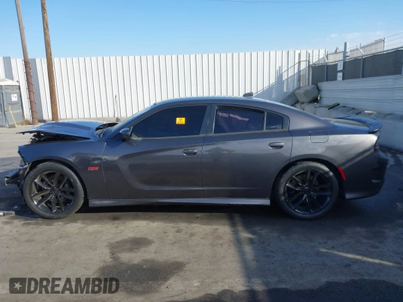 2019 Dodge Charger Scat Pack with VIN 2C3CDXGJ7KH588717, listed as a IAAI auction lot 41694673 with Not Provided miles and . Bid and sale history available at DreamBid. Image 13.