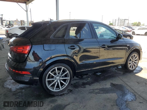 2018 Audi Q3 Premium with VIN WA1BCCFS9JR033287, listed as a Copart auction lot 58251185 with 157,839 mi miles and Salvage title. Bid and sale history available at DreamBid. Image 3.
