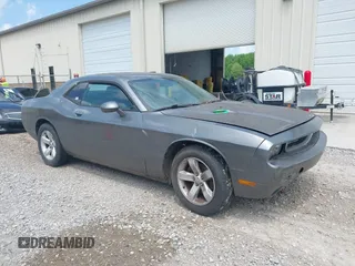2011 Dodge Challenger z VIN 2B3CJ4DG9BH570295, wystawiony jako IAAI lot #42288192 z przebiegiem 162 094 mil mil oraz . Historia ofert i sprzedaży dostępna na DreamBid. Obrazek 1.