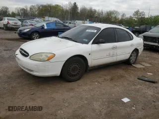 2001 Ford Taurus LX z VIN 1FAFP522X1G253097, wystawiony jako Copart lot #53783725 z przebiegiem 178 834 mil mil oraz Szkoda całkowita • Salvage title. Historia ofert i sprzedaży dostępna na DreamBid. Obrazek 1.