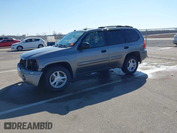 2005 GMC Envoy SLE z VIN 1GKDT13S252331044, wystawiony jako IAAI lot #41749219 z przebiegiem 263 876 mil mil oraz . Historia ofert i sprzedaży dostępna na DreamBid. Obrazek 2.