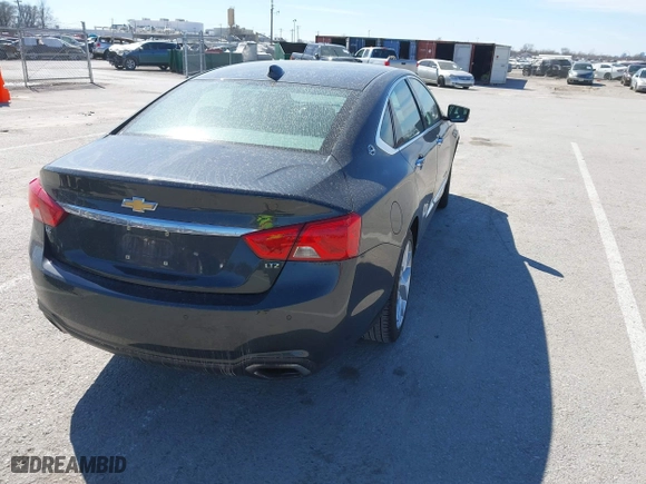 2015 Chevrolet Impala LTZ with VIN 2G1165S31F9136460, listed as a IAAI auction lot 41805917 with 136,254 mi miles. Bid and sale history available at carsss.com. Image 4.