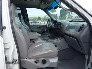 1999 Ford Expedition XLT z VIN 1FMPU18L0XLA32023, wystawiony jako IAAI lot #41976697 z przebiegiem Nie podano mil oraz . Historia ofert i sprzedaży dostępna na DreamBid. Obrazek 5.