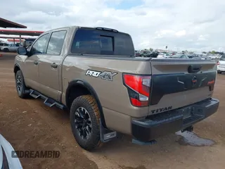 2021 Nissan Titan Pro-4X with VIN 1N6AA1ED9MN519749, listed as a IAAI auction lot 41948962 with 65,807 mi miles and . Bid and sale history available at DreamBid. Image 3.