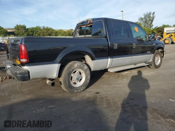 2003 Ford Super Duty F-250 XL with VIN 1FTNW20P63ED04454, listed as a Copart auction lot 86355444 with 154,194 mi miles and Salvage Title. Bid and sale history available at carsss.com. Image 3.