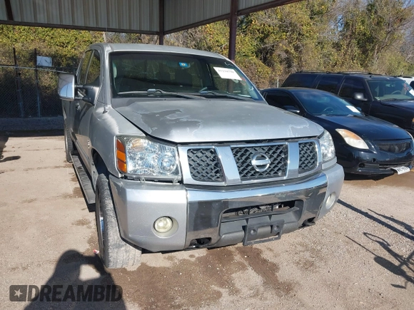 2004 Nissan Titan LE z VIN 1N6AA07BX4N537229, wystawiony jako IAAI lot #41234790 z przebiegiem 210 475 mil mil oraz . Historia ofert i sprzedaży dostępna na DreamBid. Obrazek 6.