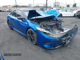 2018 Toyota Camry XSE with VIN 4T1BZ1HK7JU018110, listed as a IAAI auction lot 42041327 with 50,899 mi miles and . Bid and sale history available at DreamBid. Image 1.