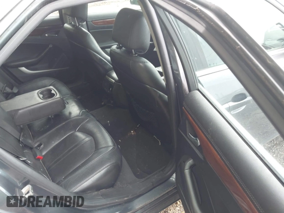 2009 Cadillac CTS AWD z VIN 1G6DT57V790133622, wystawiony jako IAAI lot #42272929 z przebiegiem 124 695 mil mil oraz . Historia ofert i sprzedaży dostępna na DreamBid. Obrazek 8.