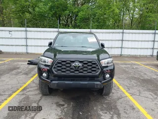 2021 Toyota Tacoma SR with VIN 3TMCZ5AN0MM417261, listed as a IAAI auction lot 42240693 with 38,625 mi miles and . Bid and sale history available at DreamBid. Image 13.