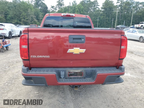 2016 Chevrolet Colorado 4WD Z71 with VIN 1GCGTDE34G1131064, listed as a Copart auction lot 61369585 with 137,769 mi miles and Salvage title. Bid and sale history available at DreamBid. Image 6.