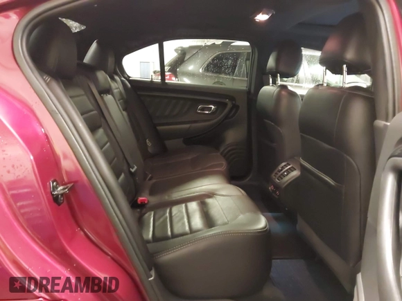 2014 Ford Taurus SHO with VIN 1FAHP2KT9EG130834, listed as a IAAI auction lot 41748199 with 98,857 mi miles and . Bid and sale history available at carsss.com. Image 8.