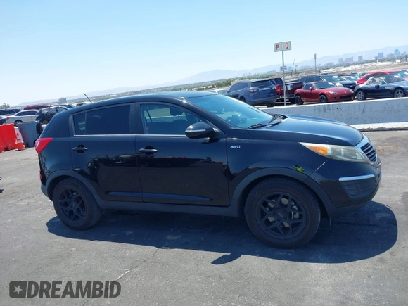2013 Kia Sportage LX with VIN KNDPBCA25D7449584, listed as a IAAI auction lot 42489414 with 100,993 mi miles and . Bid and sale history available at DreamBid. Image 13.