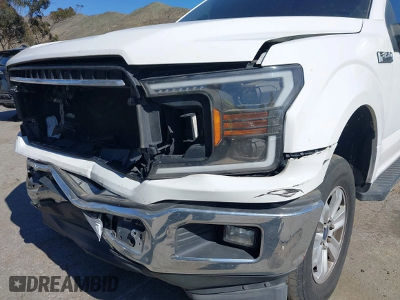 2018 Ford F-150 XL with VIN 1FTEW1CP0JKC28072, listed as a IAAI auction lot 41558764 with 153,402 mi miles. Bid and sale history available at carsss.com. Image 6.