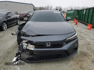 2023 Honda Civic EX z VIN 2HGFE1F70PH306337, wystawiony jako Copart lot #46122695 z przebiegiem 48 200 mil mil oraz Szkoda całkowita • Salvage title. Historia ofert i sprzedaży dostępna na DreamBid. Obrazek 5.