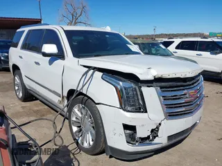 2016 Cadillac Escalade Platinum z VIN 1GYS4DKJ0GR289536, wystawiony jako IAAI lot #41724856 z przebiegiem 197 363 mil mil oraz . Historia ofert i sprzedaży dostępna na DreamBid. Obrazek 1.