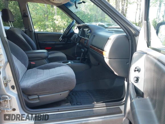 1998 Jeep Grand Cherokee Laredo with VIN 1J4GZ58S6WC154415, listed as a IAAI auction lot 42331831 with 163,723 mi miles and . Bid and sale history available at DreamBid. Image 5.