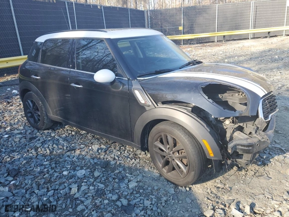 2014 MINI Cooper Countryman S with VIN WMWZC3C51EWP25860, listed as a Copart auction lot 47460235 with 128,314 mi miles and Salvage Title. Bid and sale history available at carsss.com. Image 4.