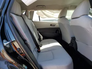 2023 Toyota Corolla Cross LE z VIN 7MUCAAAG6PV047607, wystawiony jako Copart lot #52454095 z przebiegiem 10 316 mil mil oraz Szkody całkowita. Historia ofert i sprzedaży dostępna na DreamBid. Obrazek 12.