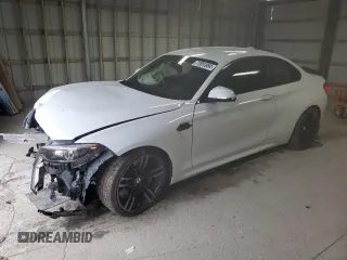2018 BMW M2 z VIN WBS1J5C5XJVD37006, wystawiony jako Copart lot #71951884 z przebiegiem 52 530 mil mil oraz Szkoda całkowita • Salvage title. Historia ofert i sprzedaży dostępna na DreamBid. Obrazek 1.