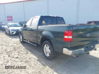 2004 Ford F-150 XLT with VIN 1FTPW12554KB97317, listed as a IAAI auction lot 42076458 with 234,619 mi miles. Bid and sale history available at carsss.com. Image 3.