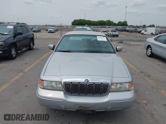 1999 Mercury Grand Marquis LS z VIN 2MEFM75W7XX659031, wystawiony jako IAAI lot #42362387 z przebiegiem 140 067 mil mil oraz . Historia ofert i sprzedaży dostępna na DreamBid. Obrazek 6.