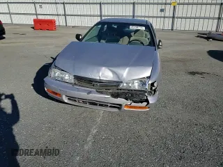 1997 Honda Accord LX with VIN 1HGCD723XVA033754, listed as a Copart auction lot 85194774 with 77,269 mi miles and Salvage Title. Bid and sale history available at carsss.com. Image 11.