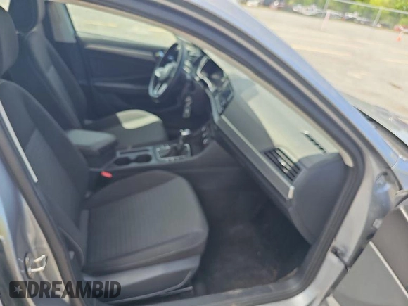 2024 Volkswagen Jetta S with VIN 3VW5M7BU8RM051840, listed as a IAAI auction lot 42852799 with 14,434 mi miles and . Bid and sale history available at DreamBid. Image 7.