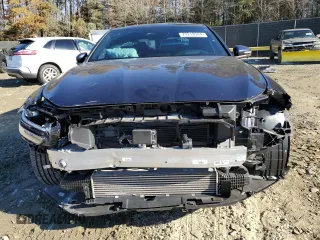 2023 Genesis G70 3.3T with VIN KMTG54TE9PU110984, listed as a Copart auction lot 79218944 with 16,702 mi miles and Salvage title. Bid and sale history available at DreamBid. Image 5.