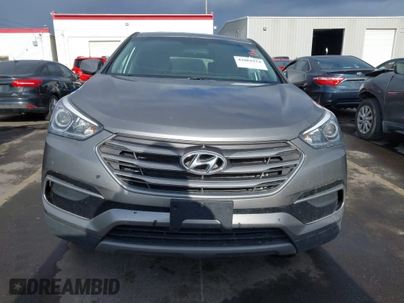 2017 Hyundai Santa Fe 2.4L with VIN 5XYZTDLB9HG440064, listed as a IAAI auction lot 42061524 with 140,365 mi miles and . Bid and sale history available at DreamBid. Image 13.