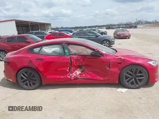 2022 Tesla Model S with VIN 5YJSA1E58NF463643, listed as a IAAI auction lot 41861483 with Not Provided miles and . Bid and sale history available at DreamBid. Image 12.