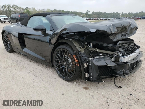 2018 Audi R8 z VIN WUAVACFX8J7900987, wystawiony jako Copart lot #45409684 z przebiegiem 6572 mil mil oraz . Historia ofert i sprzedaży dostępna na DreamBid. Obrazek 4.