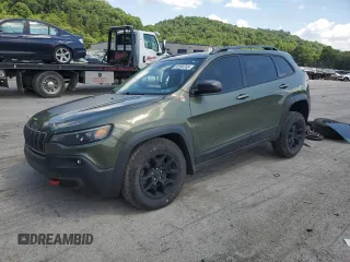 2021 Jeep Cherokee Trailhawk with VIN 1C4PJMBX0MD185078, listed as a Copart auction lot 63264765 with 92,393 mi miles and Salvage title. Bid and sale history available at DreamBid. Image 1.