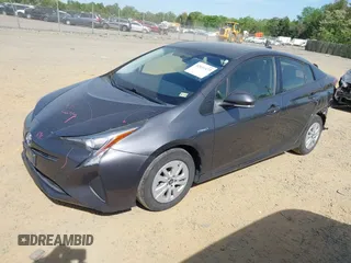 2016 Toyota Prius Two with VIN JTDKBRFU6G3510041, listed as a IAAI auction lot 42031473 with 157,885 mi miles. Bid and sale history available at carsss.com. Image 17.