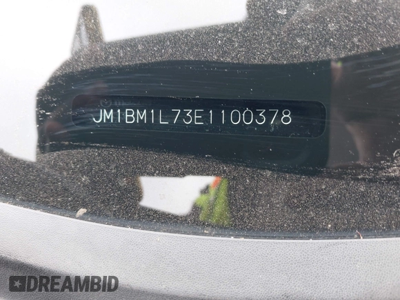2014 Mazda 3 i Touring z VIN JM1BM1L73E1100378, wystawiony jako IAAI lot #42069396 z przebiegiem 91 973 mil mil oraz . Historia ofert i sprzedaży dostępna na DreamBid. Obrazek 17.