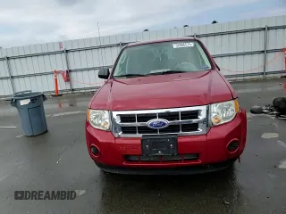 2011 Ford Escape XLS with VIN 1FMCU9C75BKC31381, listed as a Copart auction lot 52886575 with 128,640 mi miles and Salvage title. Bid and sale history available at DreamBid. Image 12.