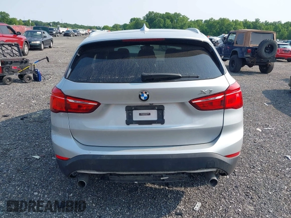 2018 BMW X1 xDrive28i with VIN WBXHT3C32J5K23486, listed as a IAAI auction lot 42387208 with 76,115 mi miles and . Bid and sale history available at DreamBid. Image 17.