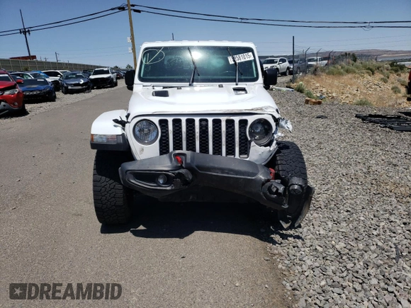 2022 Jeep Gladiator Rubicon z VIN 1C6JJTBG4NL135430, wystawiony jako Copart lot #52581015 z przebiegiem 54 553 mil mil oraz Szkoda całkowita • Salvage title. Historia ofert i sprzedaży dostępna na DreamBid. Obrazek 5.